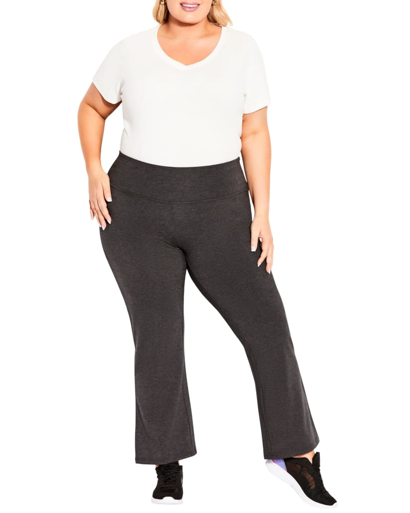 Front of a model wearing a size 2224 Kendall Flared Legging in Charcoal by avenue. | dia_product_style_image_id:297826